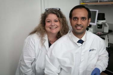 a person and person in lab coats